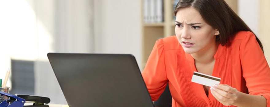 upset woman online shopping