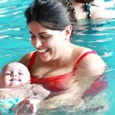baby floating in pool