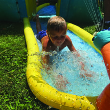 boy on water slide