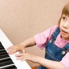 girl learning keyboards afterschool