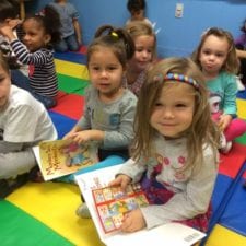 preschool kids with books