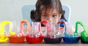 kid doing science experiment