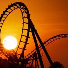 roller coaster tracks at sunset