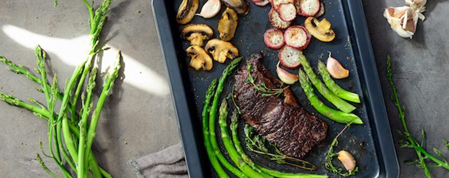 steak with mushrooms, turnips, garlic and asparagus