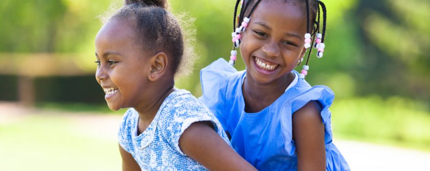 girls playing outdoors