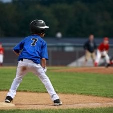 little league player on third base