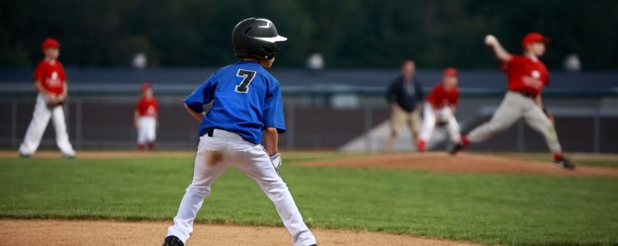 little league player on third base