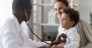 pediatrician with child