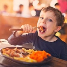 kid stuffing his face