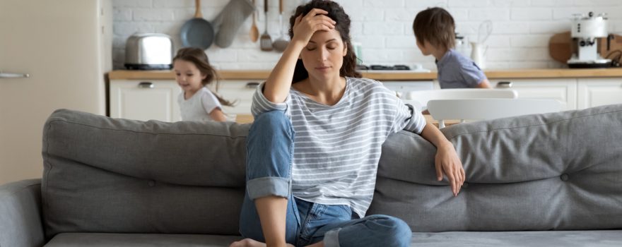 Stressed mom on couch