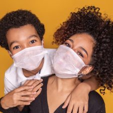 mom and son in covid mask