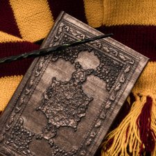 harry potter scarf, book and wand