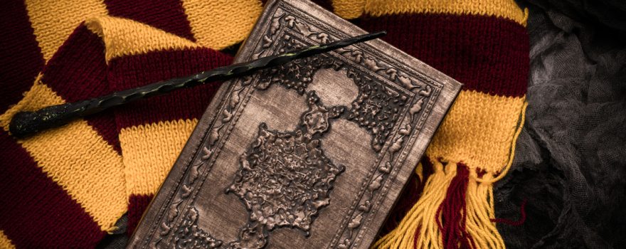 harry potter scarf, book and wand