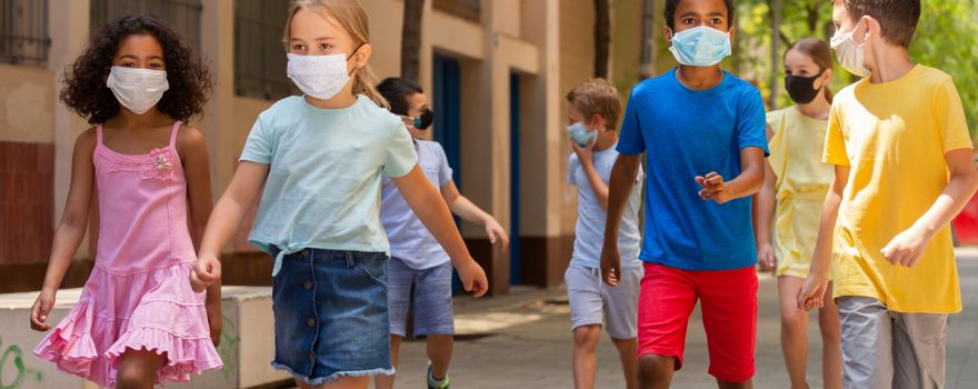 kids in masks walking
