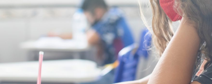 kids in masks taking tests