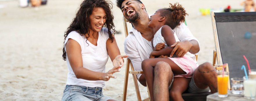 family enjoying the beach