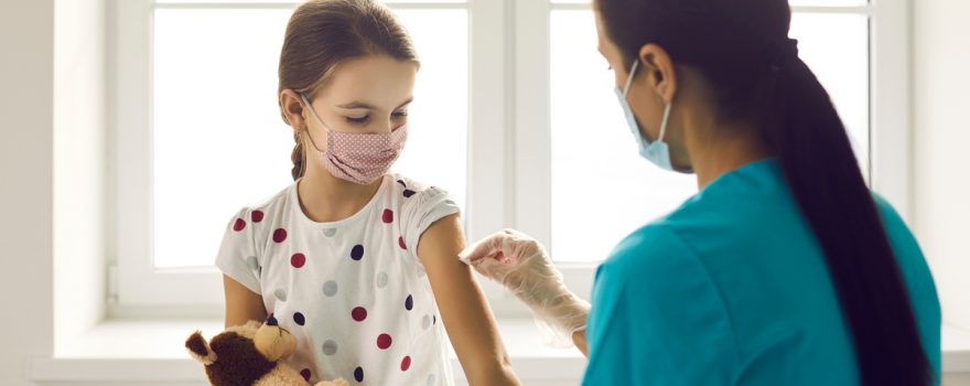 child getting vaccine