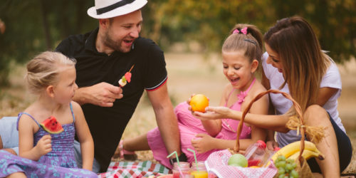 family outside on a picnic