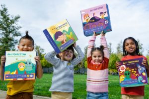 kids holding books