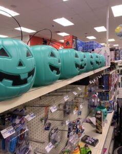 teal pumpkin buckets that people can put on their doorstep to signal that non-food goodies and food allergy safe treats are available for trick or treaters, which is one of several trick-or-treating safety tips to follow