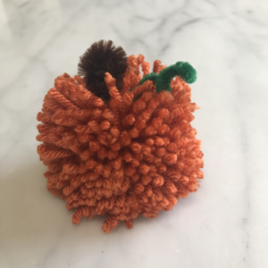 fall craft project in the shape of pumpkin