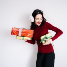 Woman with holiday gifts.