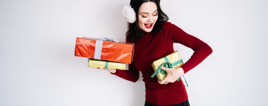 Woman with holiday gifts.