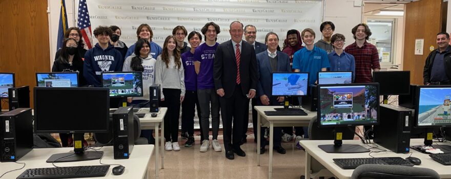 a group photo of students with local officials.