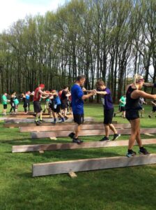 People on a balance beam