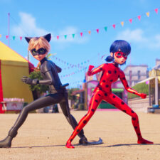 Animated scene of two superhero characters from Miraculous: Ladybug & Cat Noir, the Movie, which is one of many kids movies stream this summer.