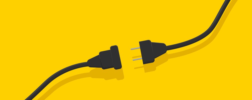 Electrical socket with plug. article is about tips for charging your phone during a power outage