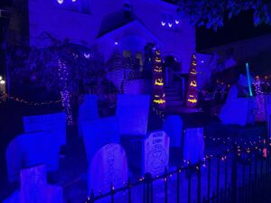 a house decorated at night for Halloween