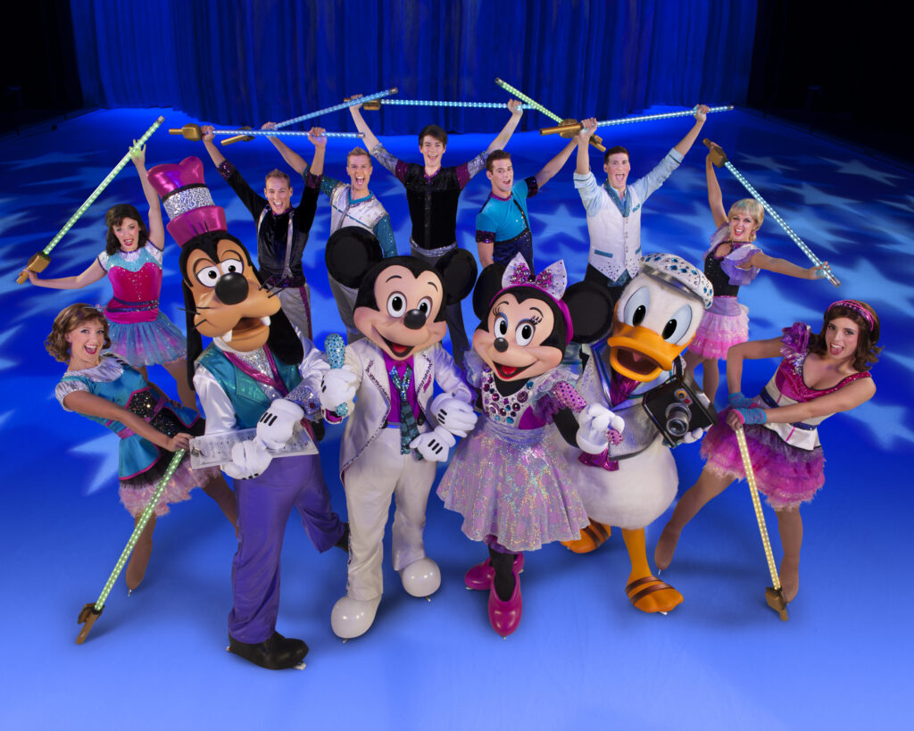 Skaters in costume performing in Disney on Ice