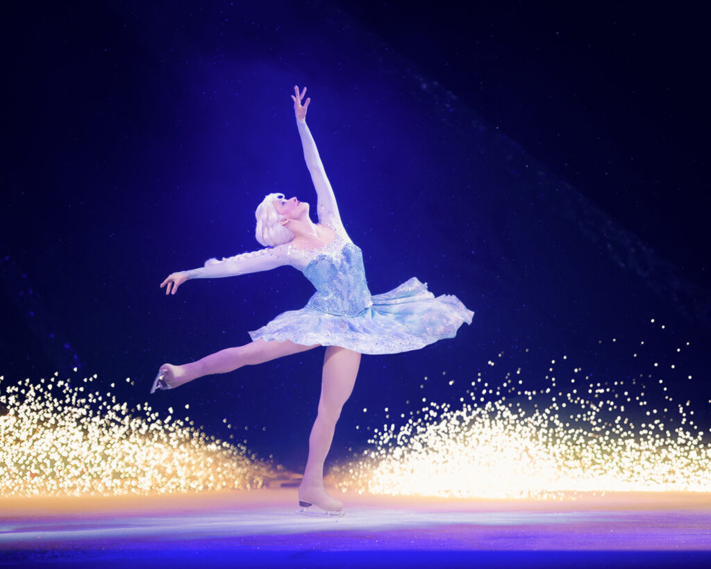 Female figure skater performing in Disney on Ice